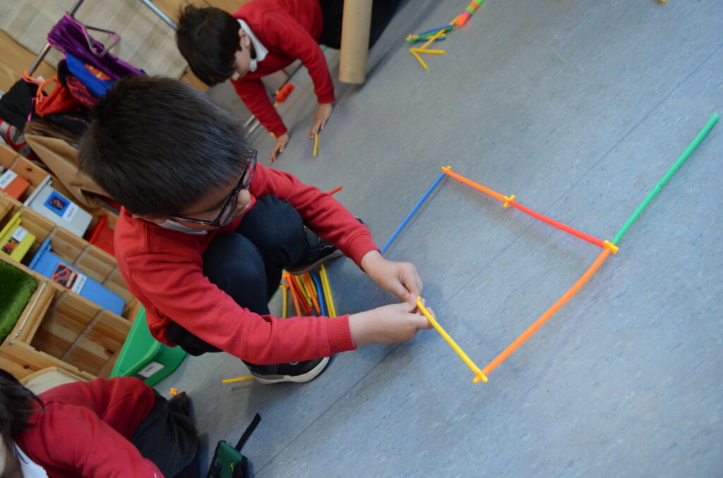 boy pupil playing classroom