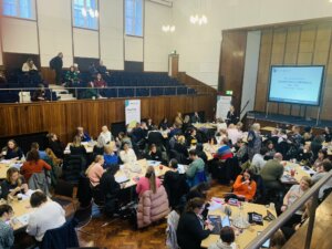 Delegates gathered in the conference hall for the Transition Conference.