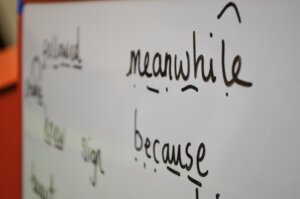 Examples of conjunctions written on a whiteboard.