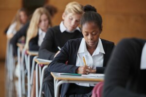 Secondary pupils sitting an exam.