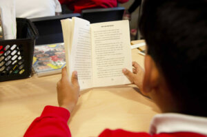 pupil reading a book