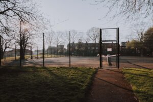 An empty outdoor tennis court.