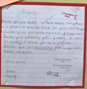 A handwritten letter from a child thanking their friend for being kind and making them laugh.