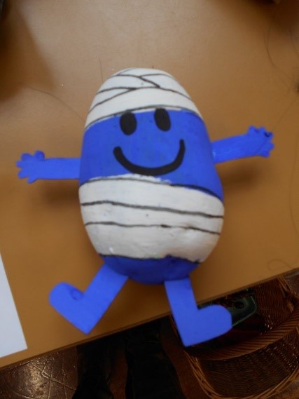 A potato painted to look like Mr Bump from the Mr Men book series.
