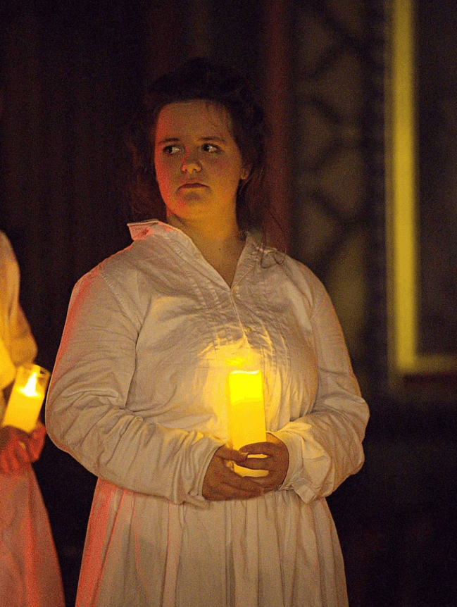 Amy Bent performing in theatrical production.